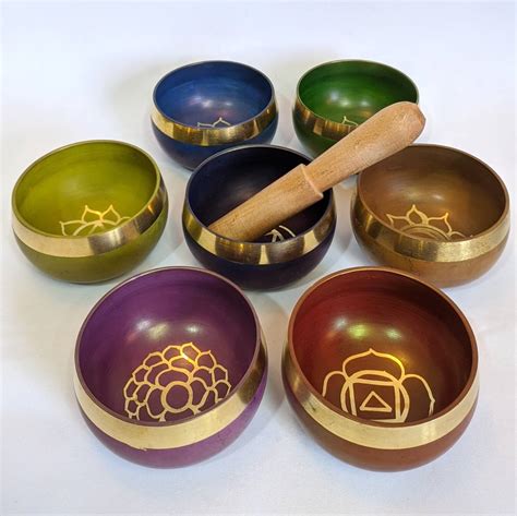 Chakra bowls - Singing bowls, with their specific frequencies, are believed to resonate with the energy centers in our bodies. Each chakra is associated with a particular sound frequency, musical note, and color. When a singing bowl is played, its tone aligns with the vibrational frequency of a specific chakra, helping to balance and unblock it.